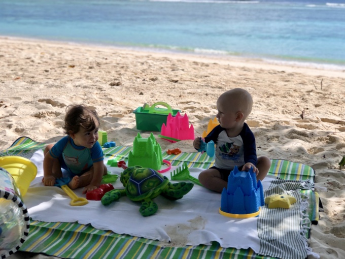 Babies playing on the beach Babies playing on the beach
